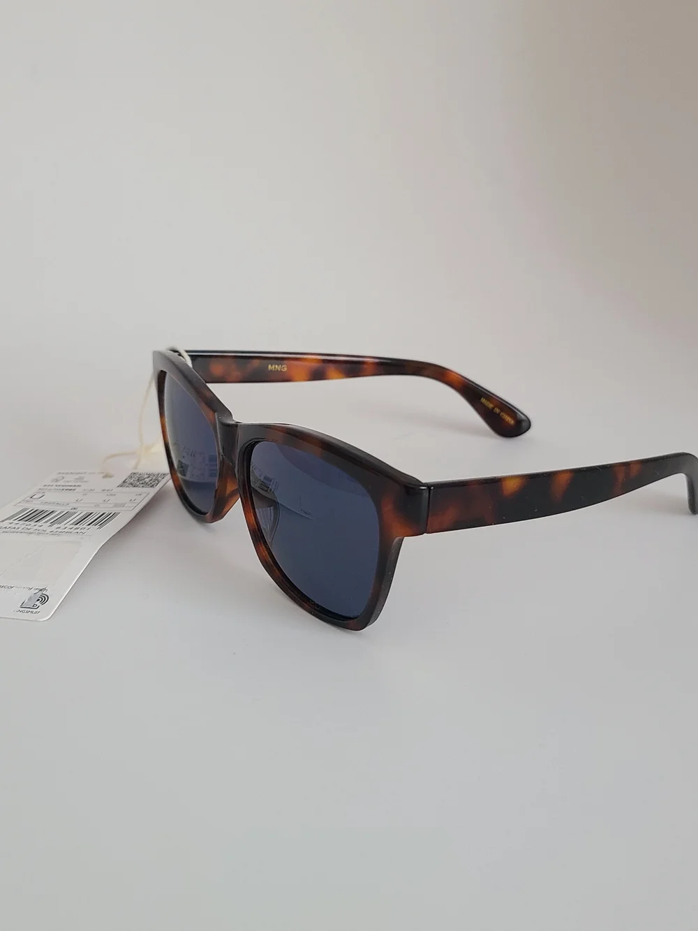 Mango Tortoiseshell Sunglasses with Dark Brow Amber Accents and Navy Blue Lenses